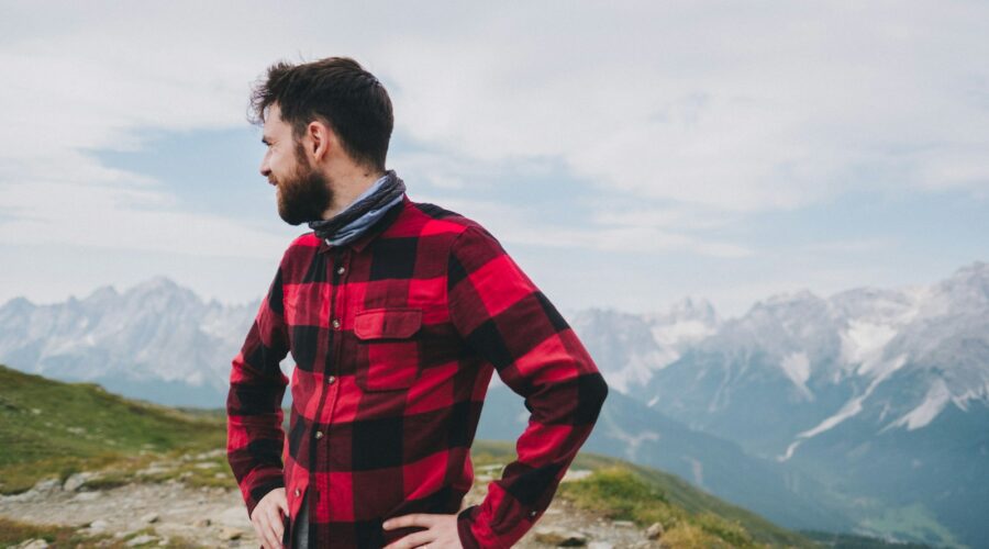 man in red and black flannel shirt